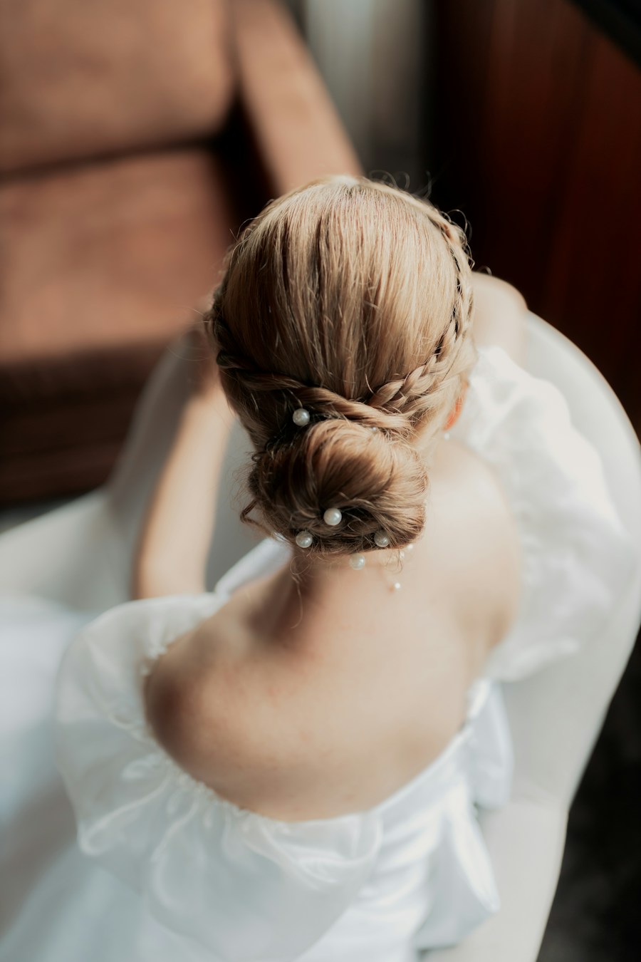 Elegant bridal updo with pearl details